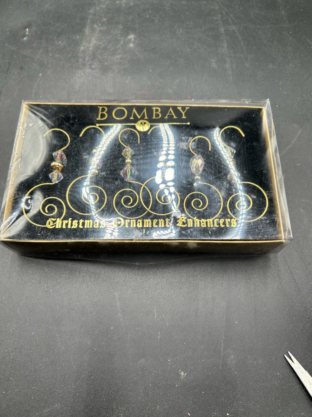 Vintage Bombay Christmas ornament enhancers, ornament holders hooks